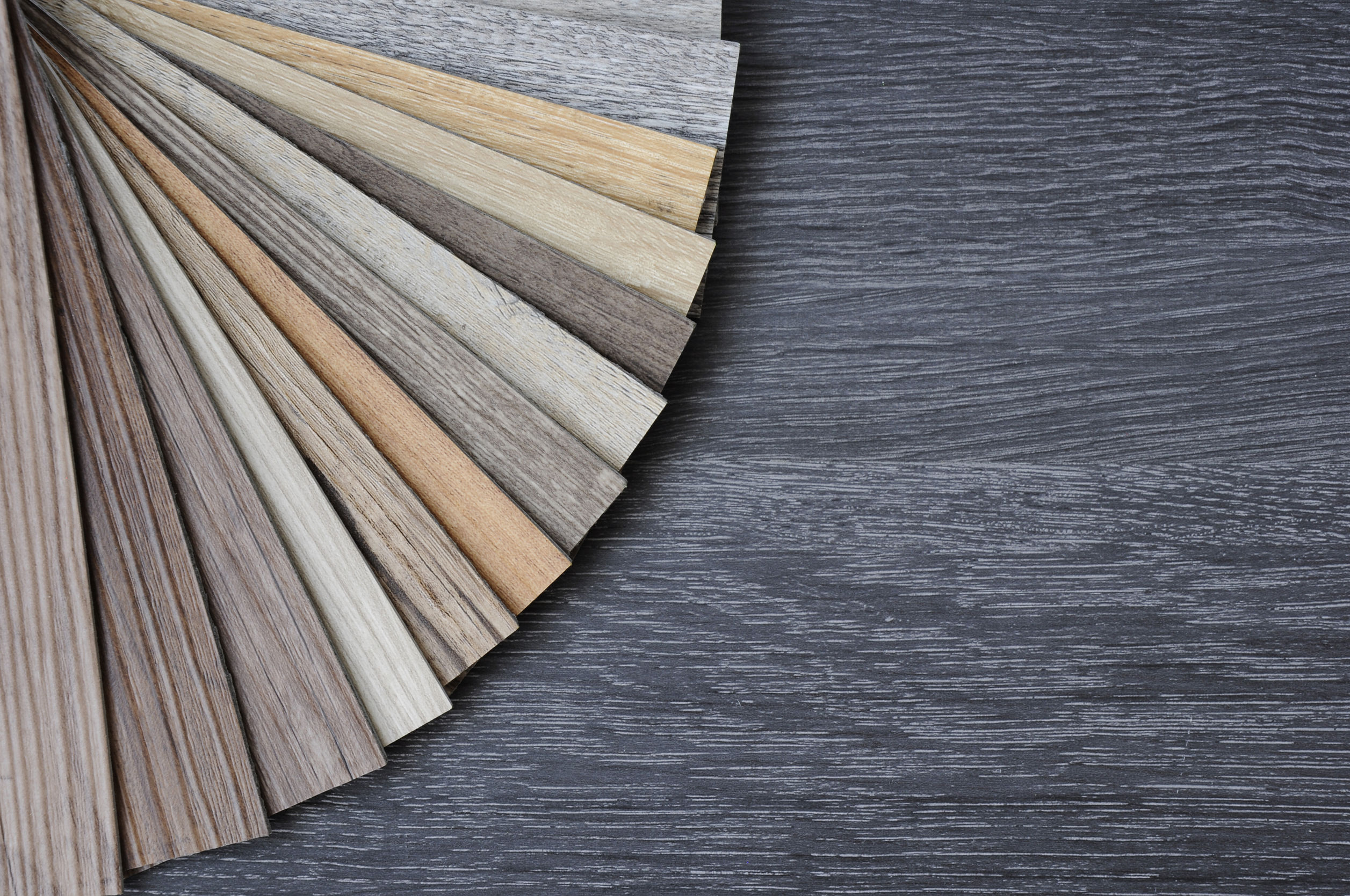 Samples of melamine and wood textures for store fixtures and display cases.